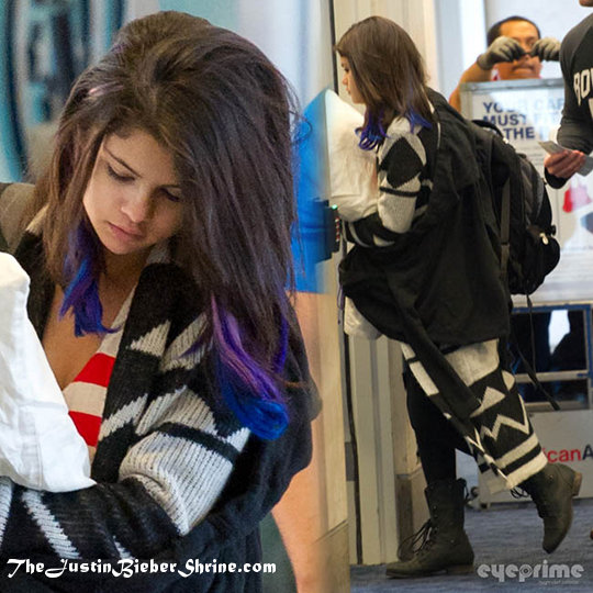selena gomez lax airport jan 2012 Justin Bieber hides his face at LAX airport Jan 21, 2012, heading to Puerto Rico 2011