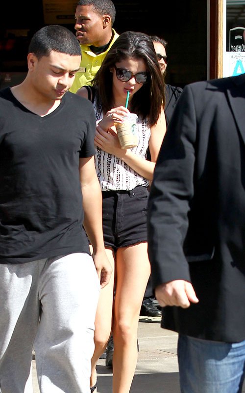 Selena Gomez with Alfredo Flores shopping at Calabasas Commons Feb 23, 2012