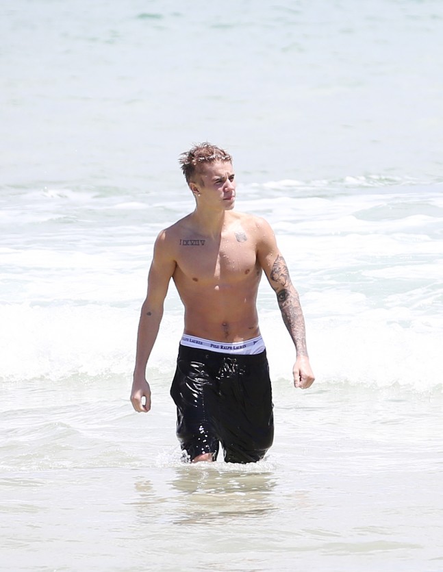 EXCLUSIVE: Justin Bieber goes surfing in Australia